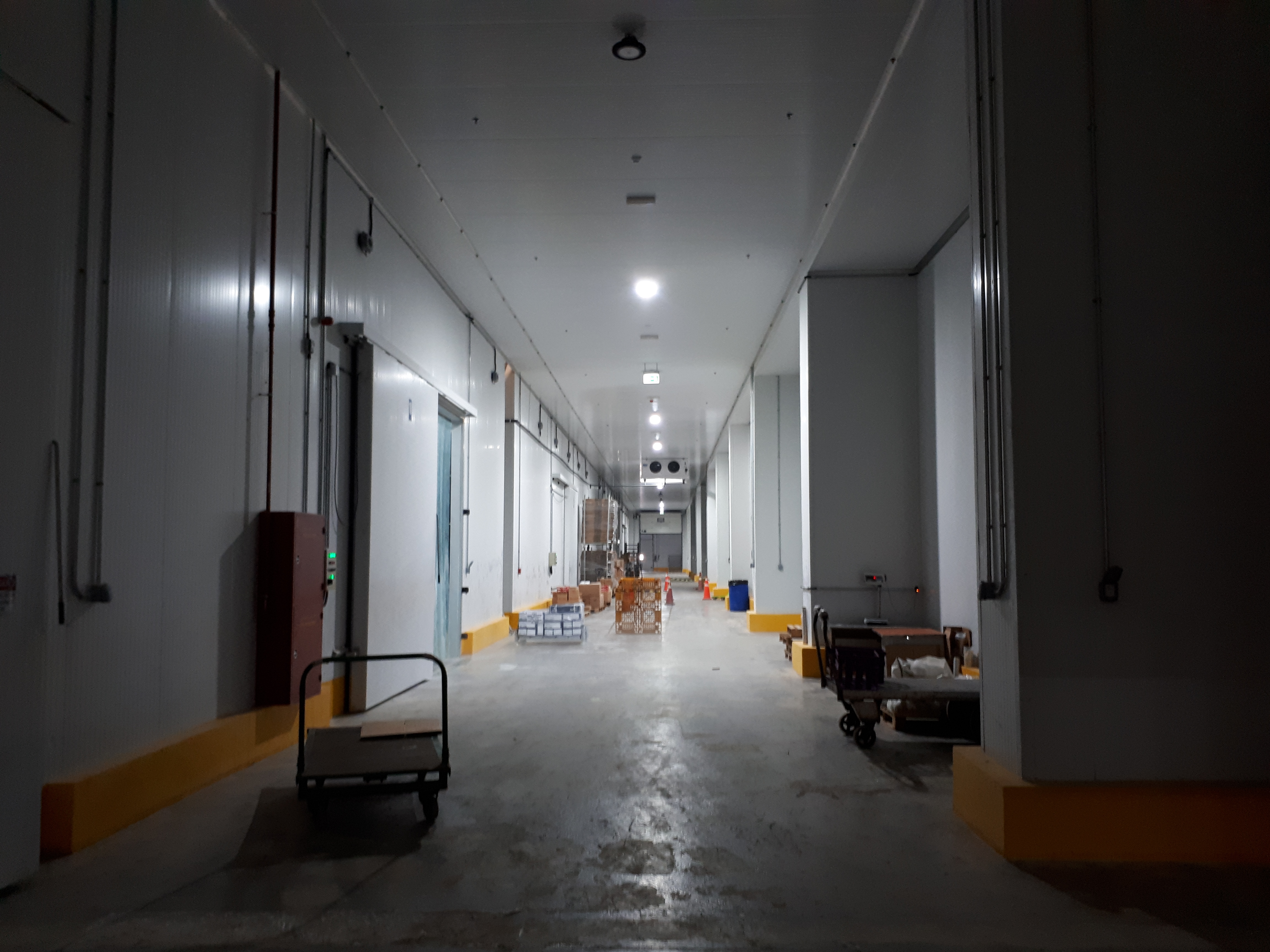 Project name: G2 International LLC, Technopark Dubai<br/>
Refrigeration contractor: Fanar al Khaleej Refrigeration<br/>
Execution: 2017-2018<br/>
Application: Logistic cold store, dry cold store, chiller and freezer cold rooms<br/>
Application with hot gas defrost + electrical in parallel<br/>
Cooling system description:<br/>
- Chilled receiving area: LU-VE Cubic 2# F50HC 1806 E 7 - 40,6kW  (10C_85%_EV-3) R404a<br/>
- 7 cold stores dual application Chiller/Freezer (various sizes): LU-VE Cubic 15# F50HC 1808 E 7 - 21,4kW (-20C_85%_EV-27C) R404a<br/>
- 2 cold stores dual application Chiller/Freezer (various sizes): LU-VE Cubic 4# F50HC 1806 E 7 - 17,4kW (-20C_85%_EV-27C) R404a<br/>
- 1 cold stores dual application Chiller/Freezer (various sizes): LU-VE Cubic 1# F45HC 1320 E 7 - 30,3kW (-20C_85%_EV-27C) R404a<br/>
- Corridor: LU-VE Cubic 2# F50HC 1706 E 6 - 40,6kW  (5_85%_EV-3) R404a<br/>
- Dry storage area (1800sqm): LU-VE Cubic 3# F71HC 4208 N 6 – 65,8kW (22C_65%_EV-27C) R134a<br/>
- Technical Store: LU-VE Cubic 1# F45HC 1112 N 4 – 28,9kW (22C_65%_EV-27C) R134a<br/>
- Plant room: LU-VE Cubic 1# F35HC 261 N 6 – 19,4kW (25C_65%_EV-27C) R134a<br/>
Rack System:<br/>
- 1# Profroid 200HP Rack for LT application R404a<br/>
- 1# Profroid 120HP Rack for MT application R134a
